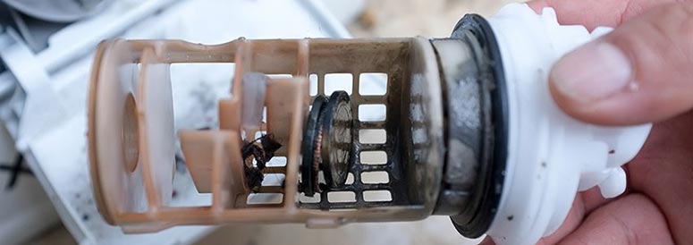 پمپ تخلیه یا فیلتر ماشین لباسشویی گرفته است